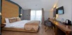 Deluxe Triple Room with Balcony Görseli