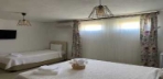 Ekonomik Üç Kişilik Bodrum Kat Oda Görseli
