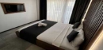Deluxe Oda Alt Kat, Havuz veya Bahçe Manzaralı Görseli