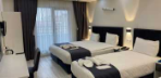 Deluxe Triple Room Görseli