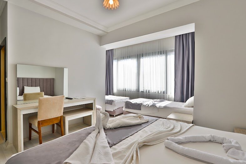 Deluxe Dört Kişilik Oda