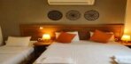Superior Triple Room Bahçe Manzaralı Görseli