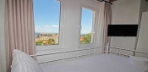 Deluxe Üç Kişilik Deniz Manzaralı Oda Görseli